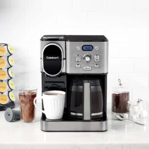 The Cuisinart 2 in 1 coffeemaker sits on a counter next to steaming cups of coffee and chilled ice coffee