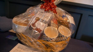 A gift basket is displayed at the ABCTX 20 year celebration silent auction