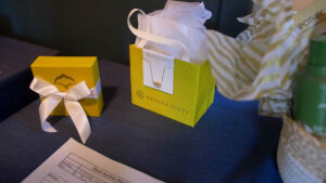 A Kendra Scott Necklace is displayed at the event silent auction
