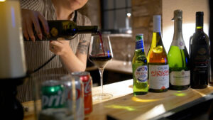 wine being poured at the bar